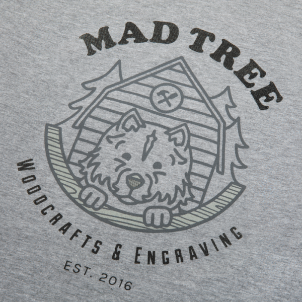 Close-up of the Mad Tree Woodcrafts & Engraving logo printed on a gray long-sleeve tee.