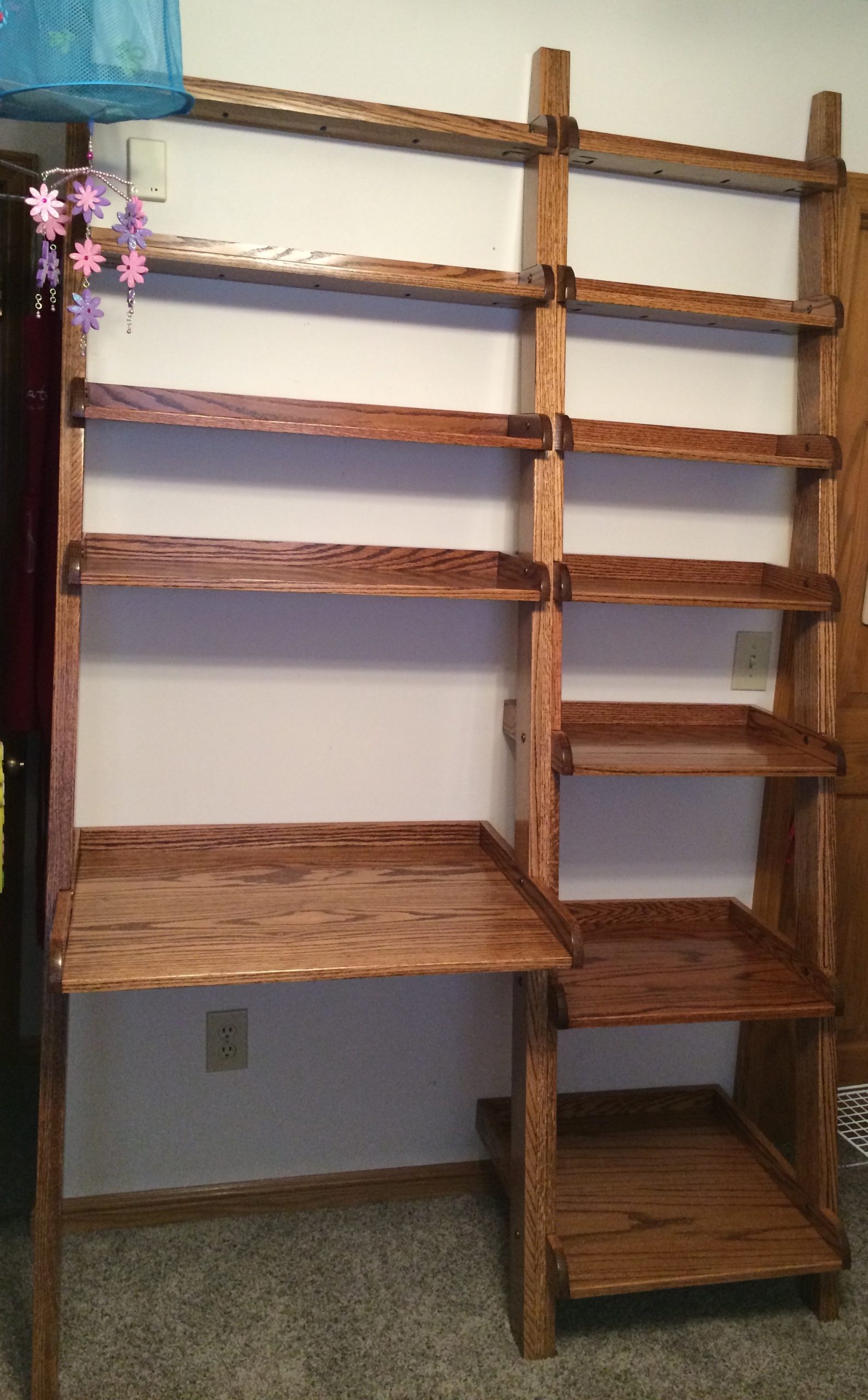 Handmade wooden desk and bookshelf, the first woodworking project Tyler Bishop Hall built for his daughter Madison.